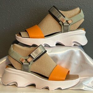 Sorel Kinetic Impact Y-Strap High Sandal in Gray and Orange